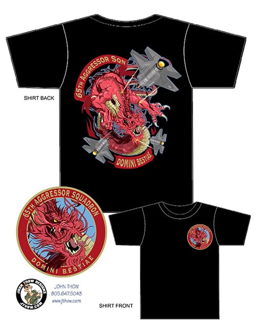 Original T-shirt artwork for the 65th Aggressor Squadron showing a dragon battling three F-35 jet fighters